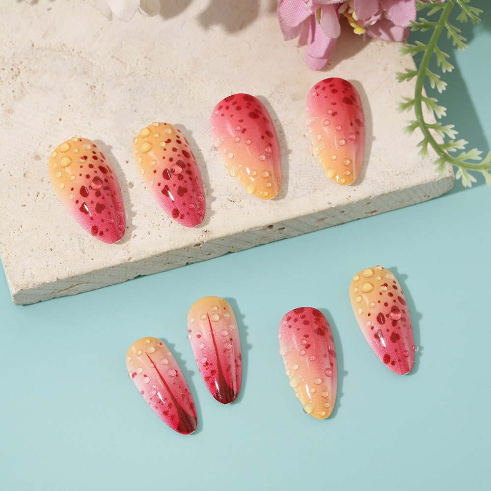 Creative artificial nails with appealing ombre and glitter effects Stornfield