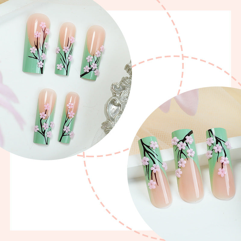 Artificial nail set with delicate flower and natural tones Stornfield