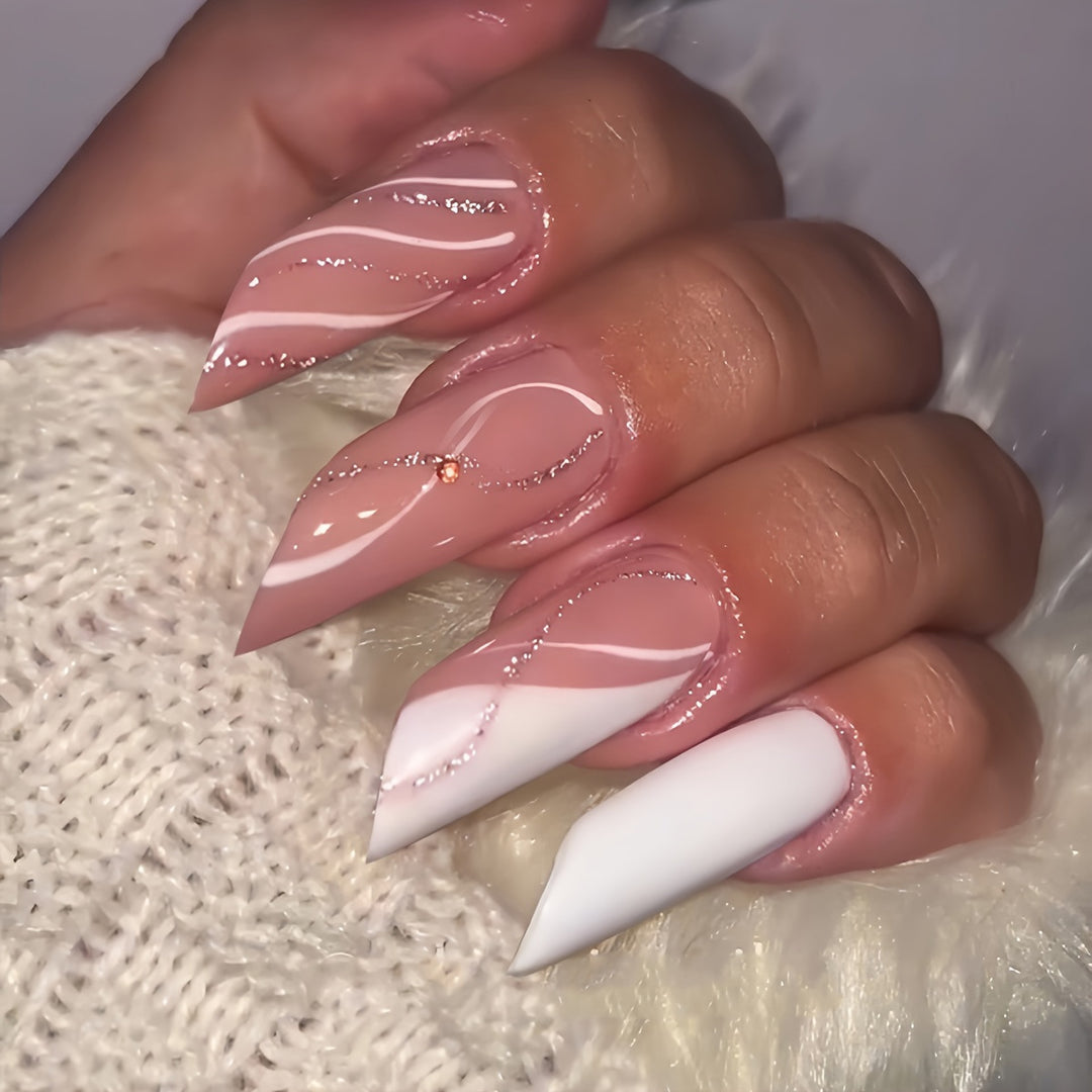 Elegant Stiletto Press-On Nail Art with Unique Designs Stornfield
