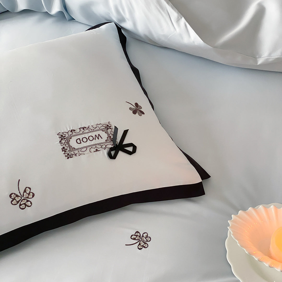 Embroidered Cotton Sateen Duvet Cover Set with Contrast Piped Edge and Ribbon Appliqué