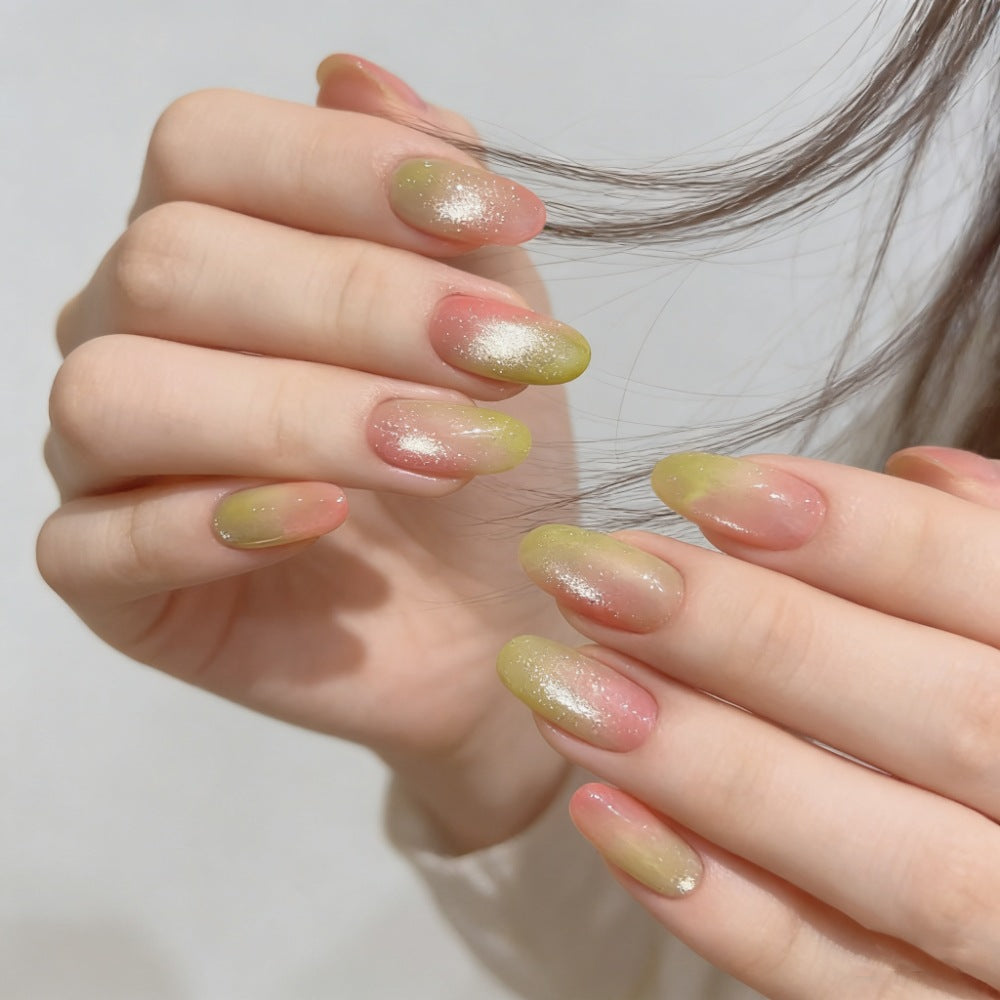Artificial nails with elegant ombre effect and glitter accents Stornfield