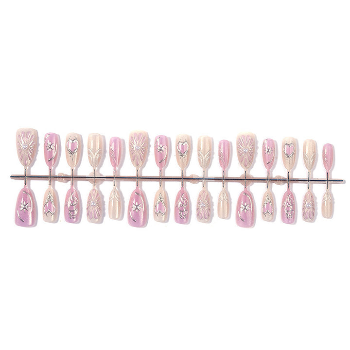 Artificial nail set with floral accents and glittering details Stornfield