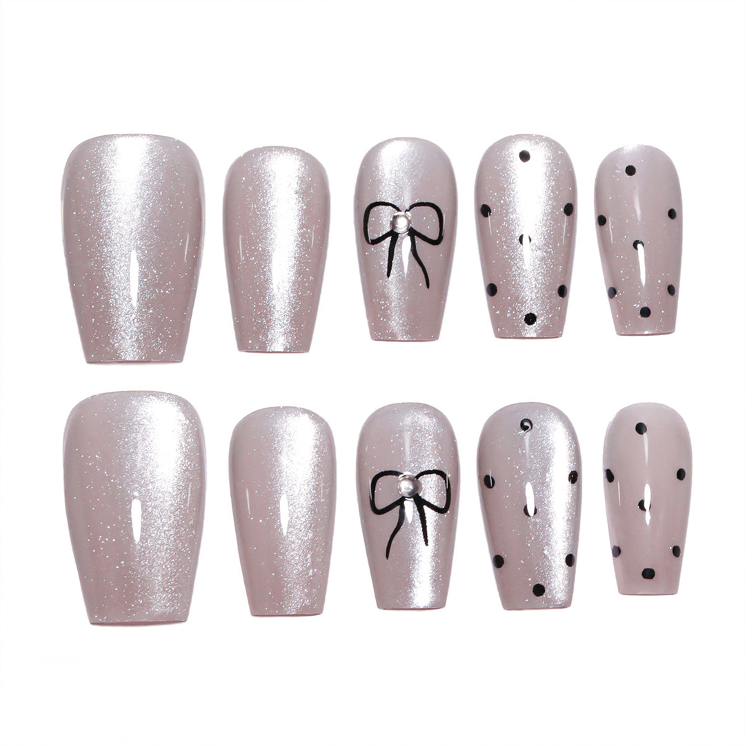 Artful Nail Extensions with Colorful Bow Motifs Stornfield