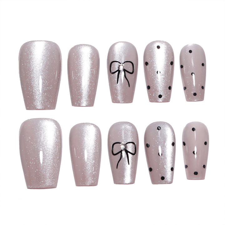 Artful Nail Extensions with Colorful Bow Motifs Stornfield