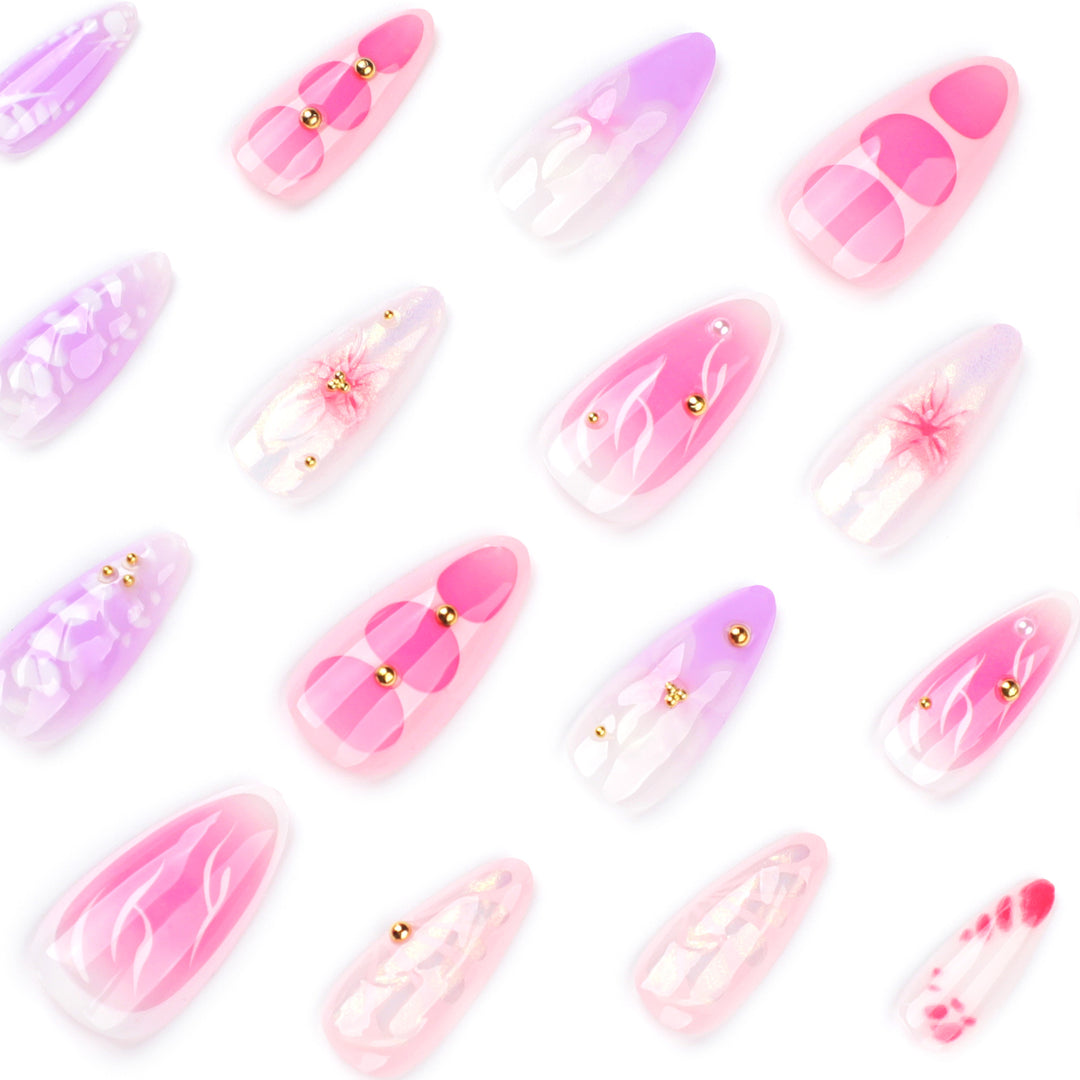 Artful Nail Extensions with Floral Patterns and Rhinestone Embellishments Stornfield