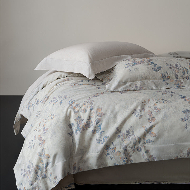 Linen-look cotton duvet cover set with delicate watercolor flower pattern and reversible function