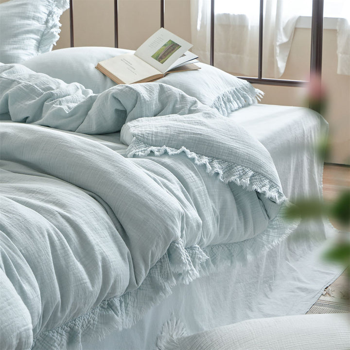 Washed linen bedding set with fringe trim and natural texture
