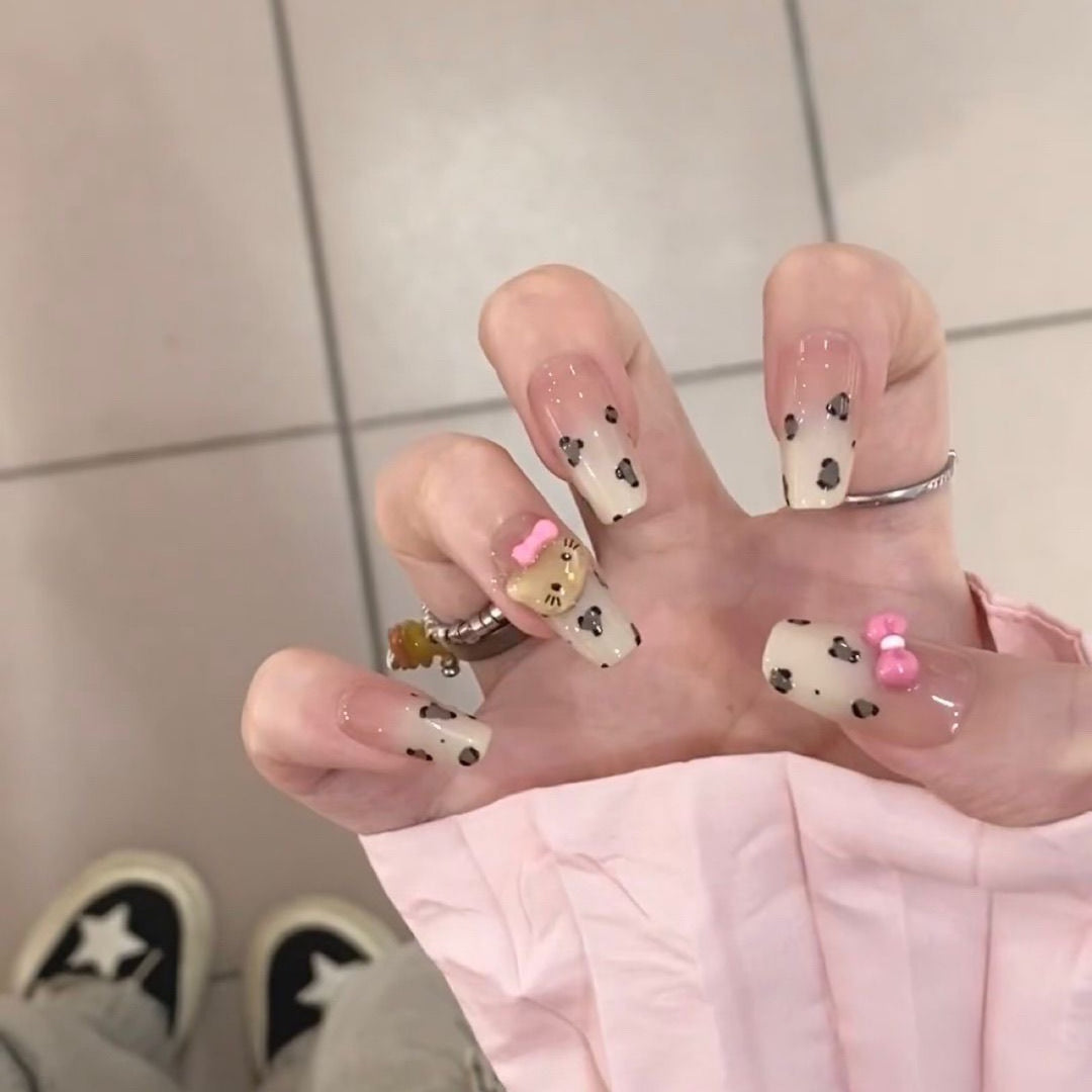 Playful art false nails with cute animal motifs Stornfield