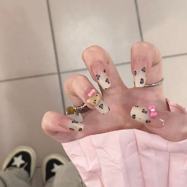 Playful art false nails with cute animal motifs Stornfield