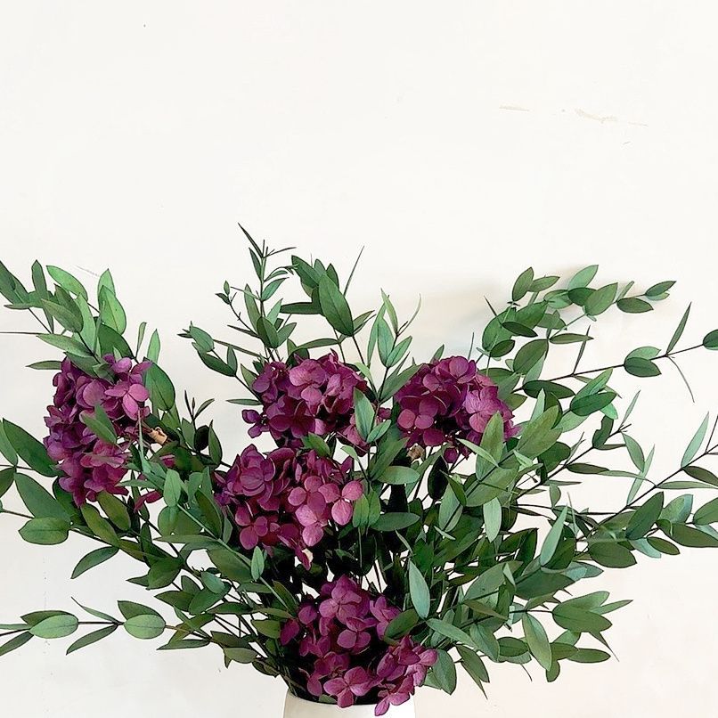Lifelike Floral Bouquet with Green Foliage