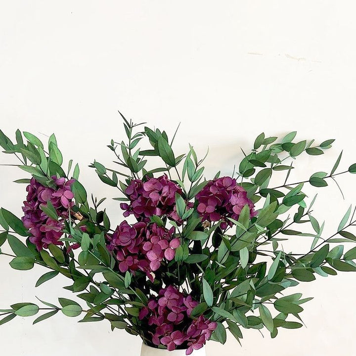 Lifelike Floral Bouquet with Green Foliage