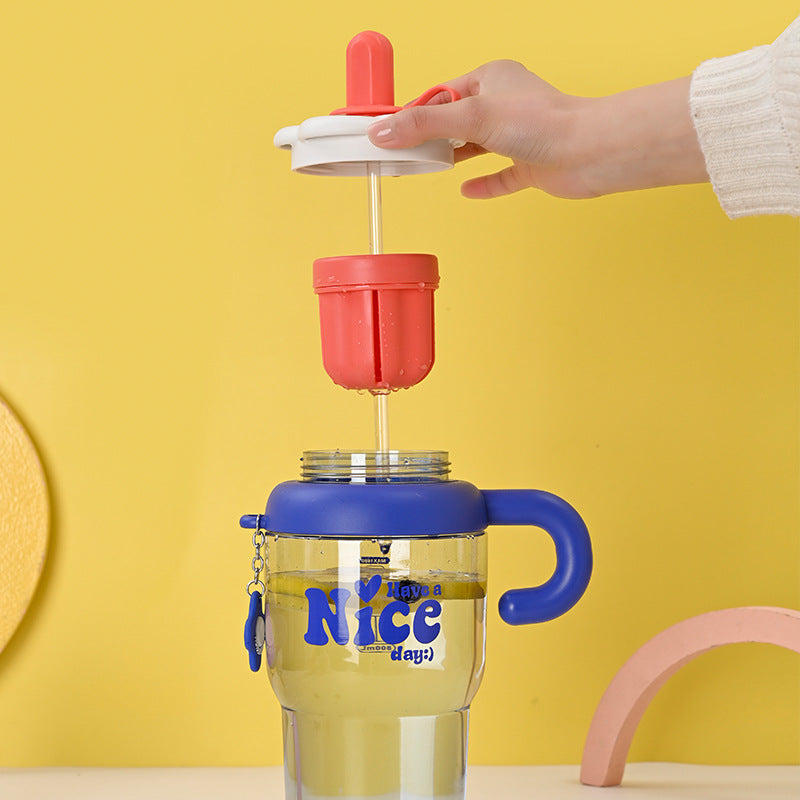 Unisex drinking cup with integrated straw and spill protection Stornfield