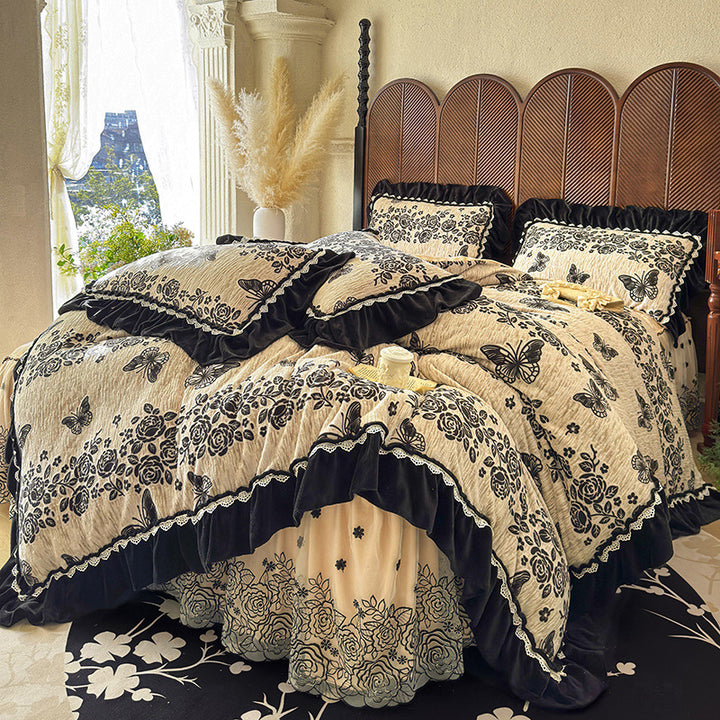 Opulentes quilted duvet cover set with velvet frill, embroidered ruffle, and bed ruffle