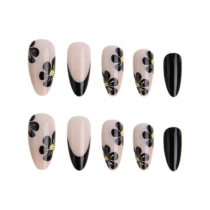 Elegant nail tips with floral accents Stornfield