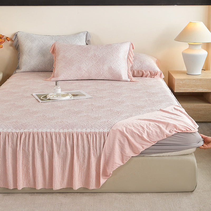 Reversible mattress protector with pleated ruffle and microfiber velvet surface