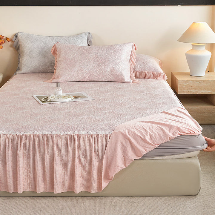 Reversible mattress protector with pleated ruffle and microfiber velvet surface