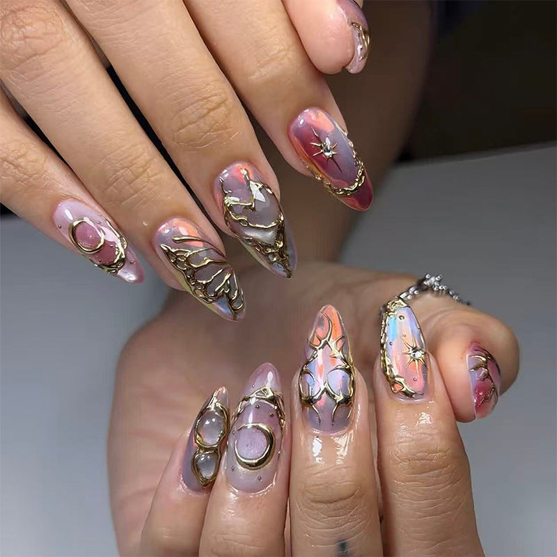 Elegant and creative artificial nails with metallic accents Stornfield