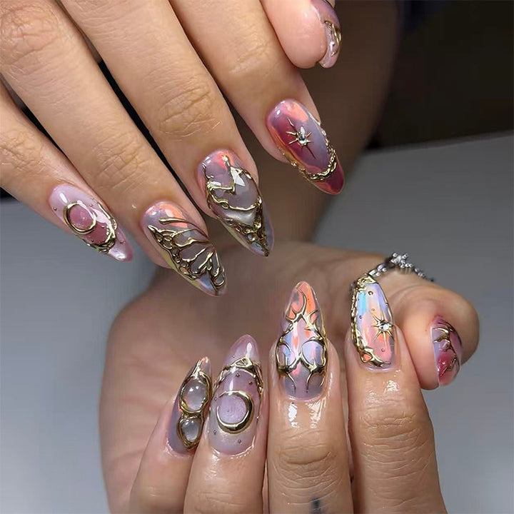 Elegant and creative artificial nails with metallic accents Stornfield