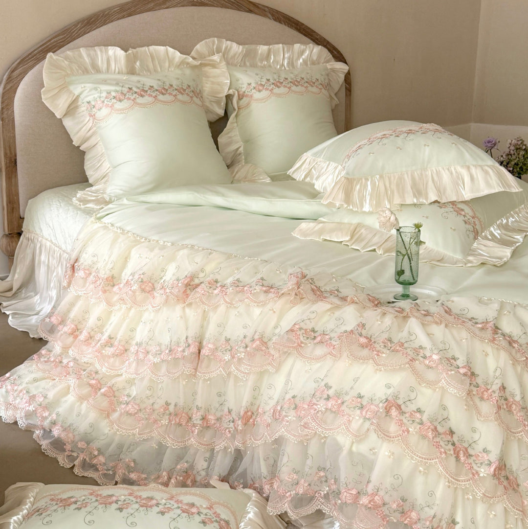 Luxurious Victorian-inspired bedding set with ruffles and embroidery