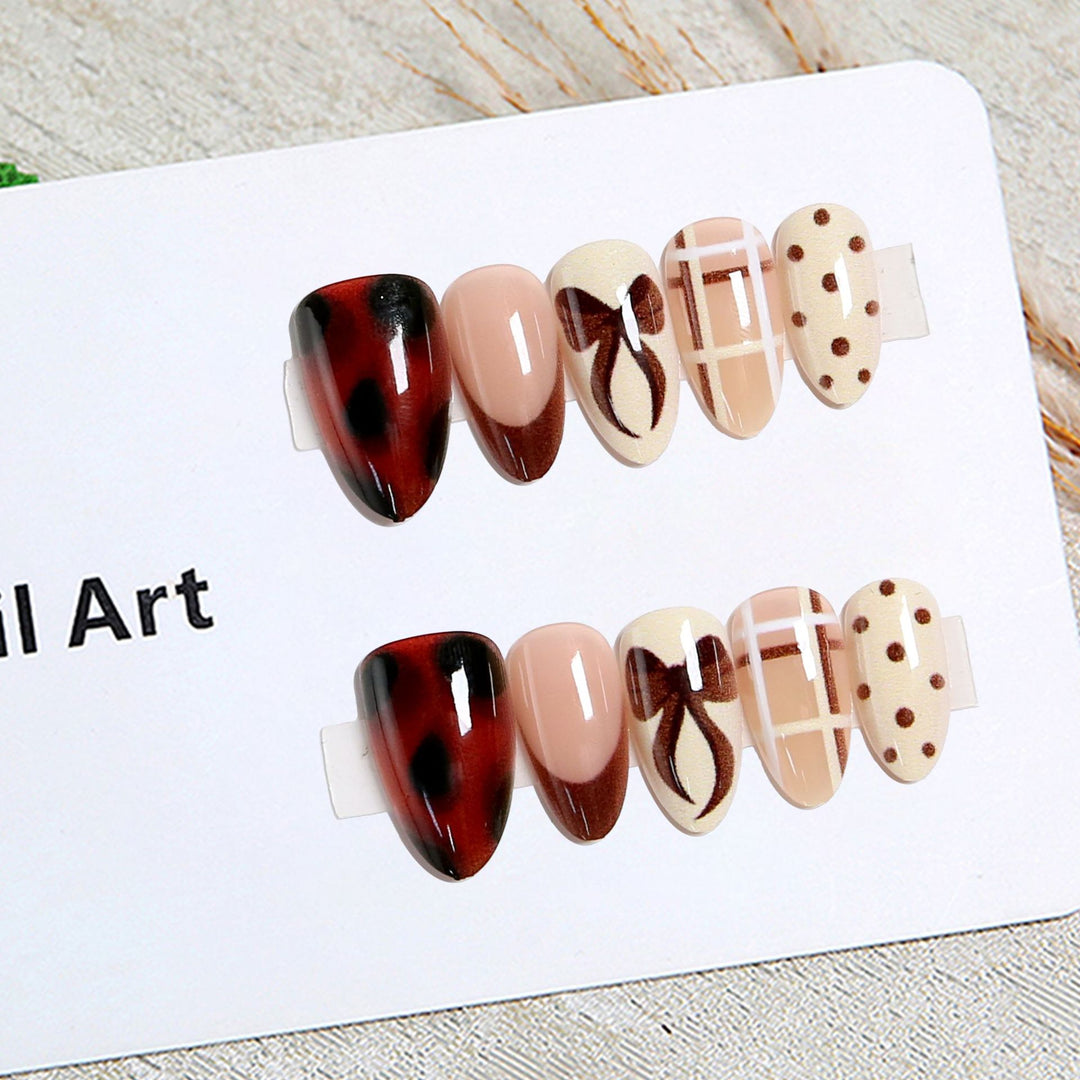 Artistic Nail Tips with Bow Design Stornfield