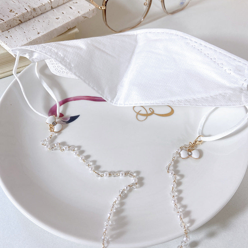 Elegant earrings with pearls and flower pendants Stornfield