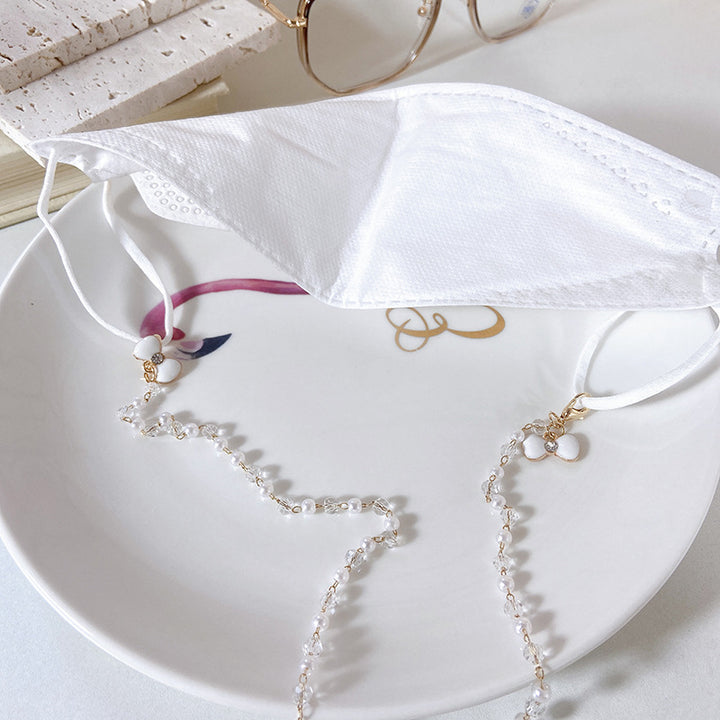 Elegant earrings with pearls and flower pendants Stornfield