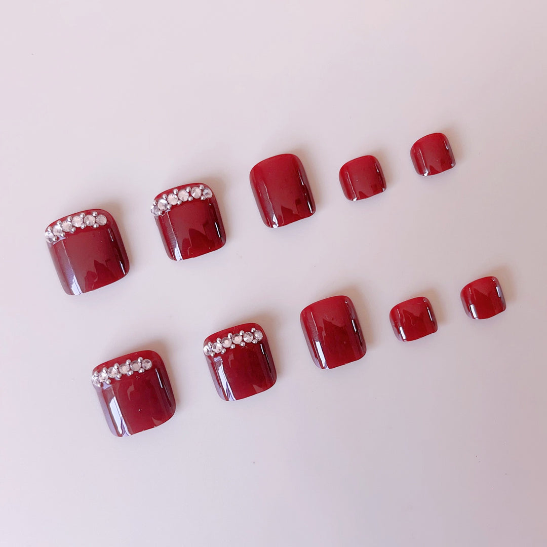Acrylic nail set with elegant nail art and sparkle elements Stornfield
