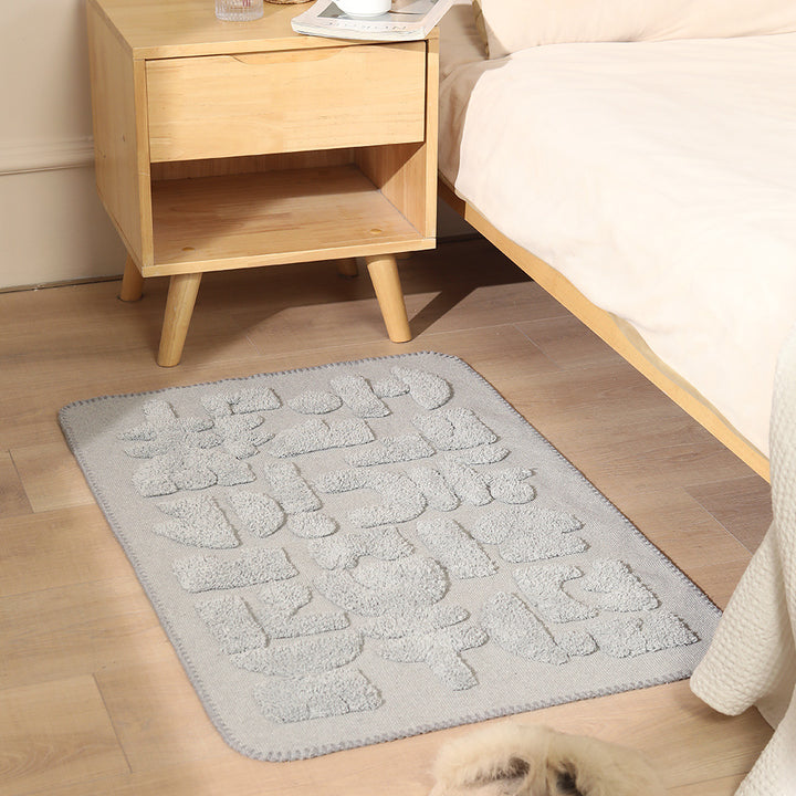 Luxurious organic cotton bath mat with relief pile structure Stornfield