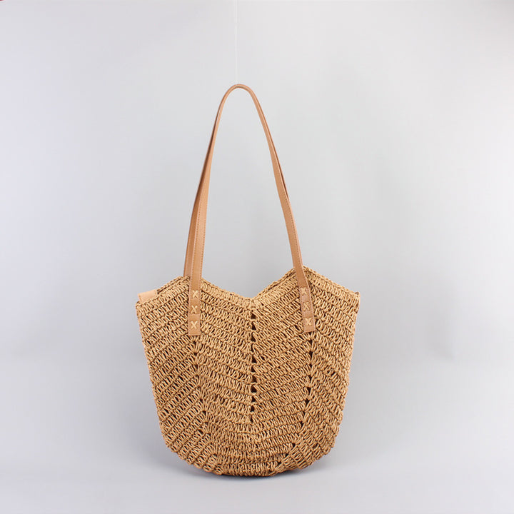Casual bag made of handwoven straw with wide leather handles Stornfield