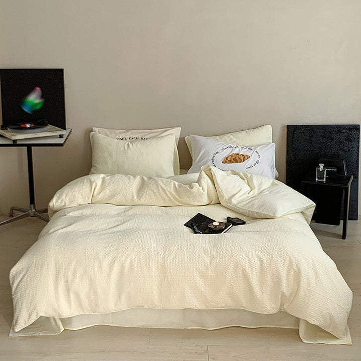 Textured cotton waffle duvet cover with pillowcases and fine contrasting piping