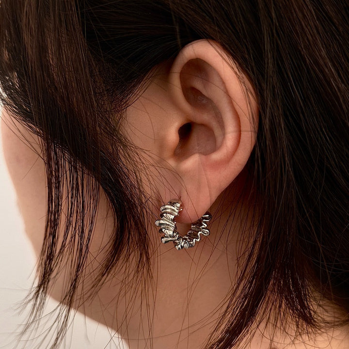 Stylish studs in modern ribbed design Stornfield