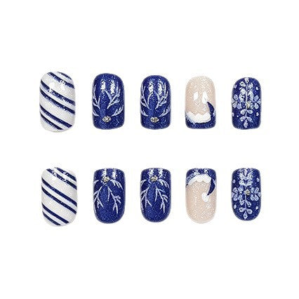 Artistic Winter-Themed Acrylic Nail Art Enhancements Stornfield