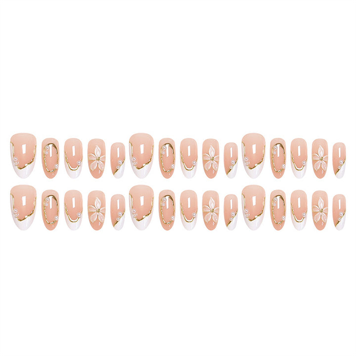 Artistic nail tips with elegant pearl design Stornfield