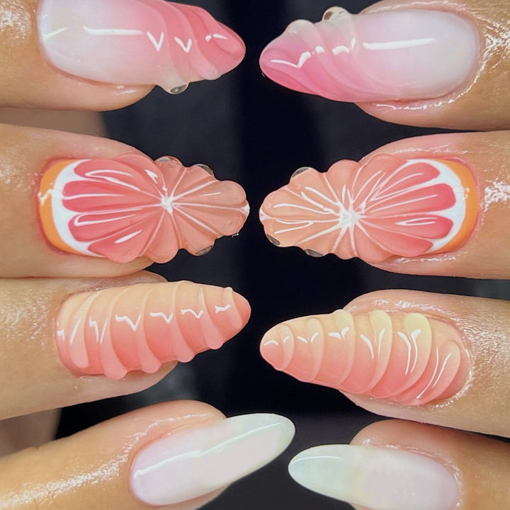 Creative nail set with subtle ombre effects and elegant decorative elements Stornfield