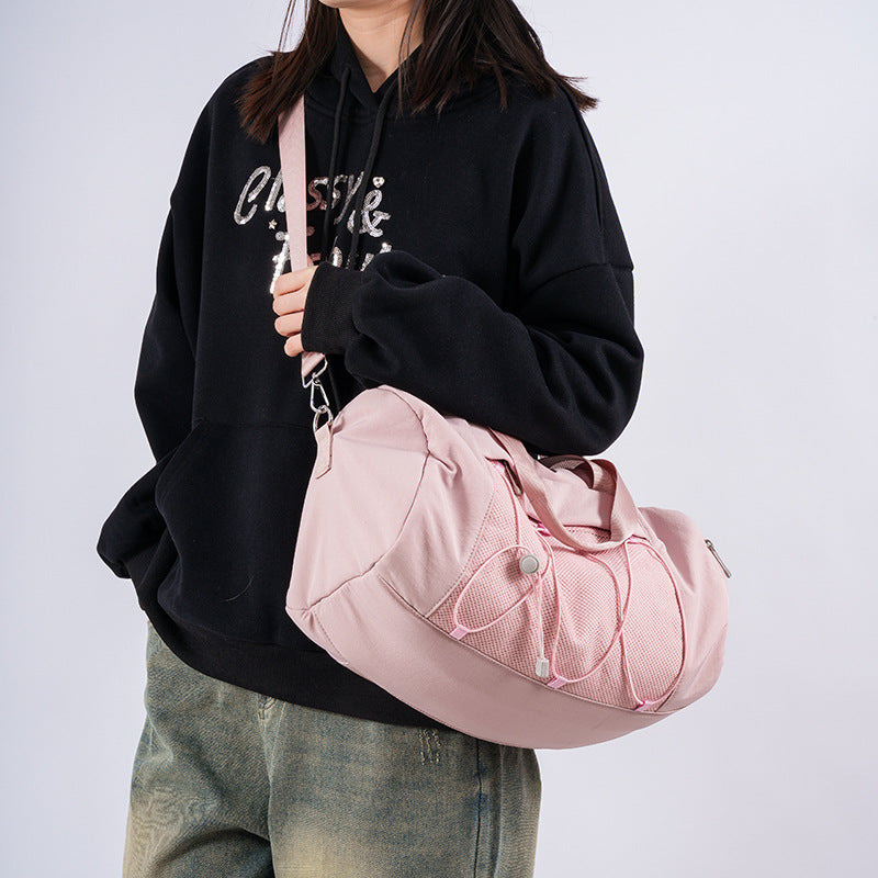 Sporty shoulder bag with adjustable carrying handles and breathable mesh material Stornfield