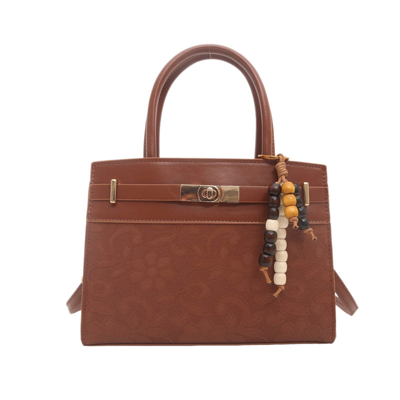 Elegant Embossed Handheld Satchel