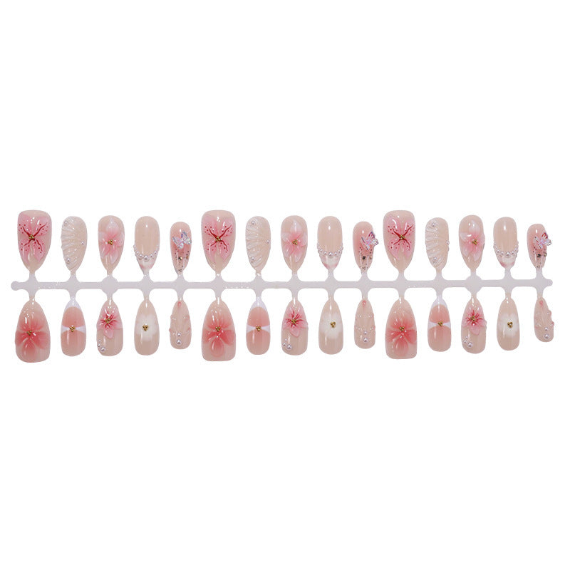 Creative nail art set with delicate flower and glitter embellishments Stornfield