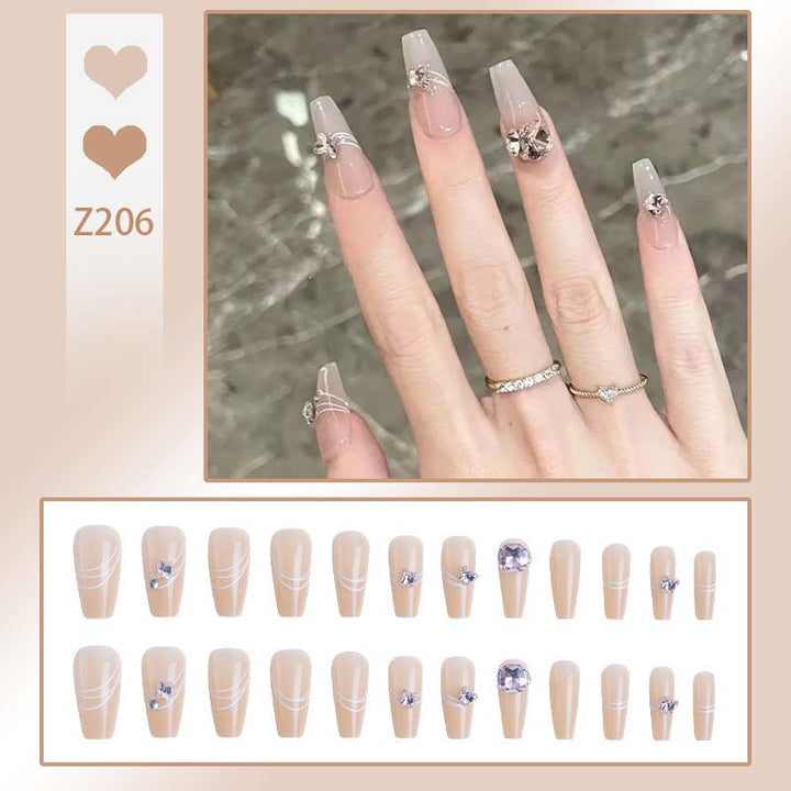 Art nail set with filigree decorations and glamorous accents Stornfield