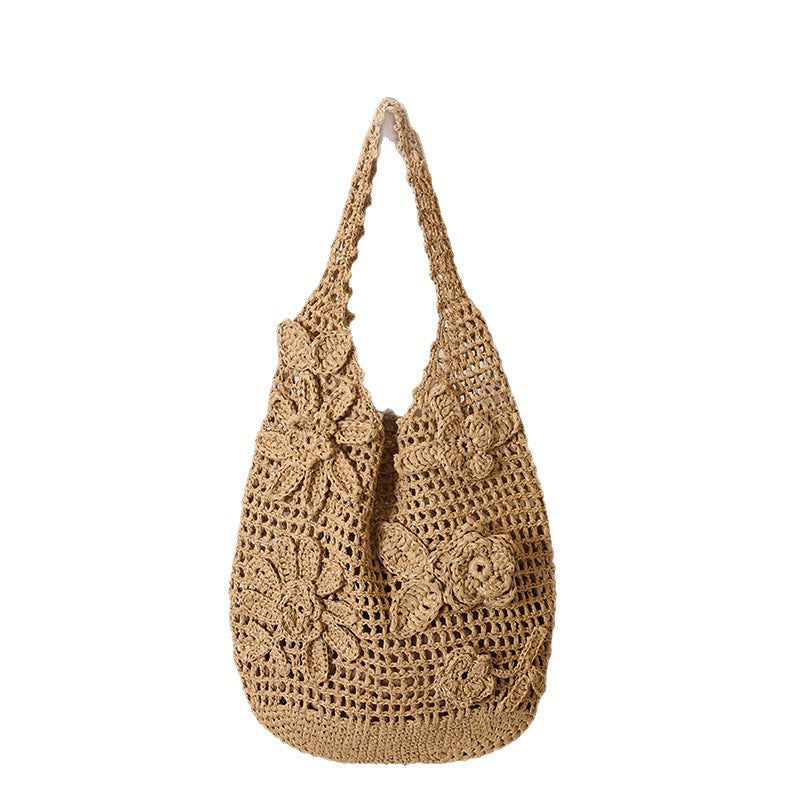 Crocheted shoulder bag with floral appliqués Stornfield