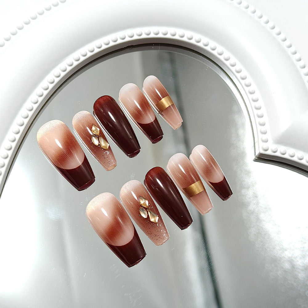 Luxurious artificial nails with glamorous decorations Stornfield
