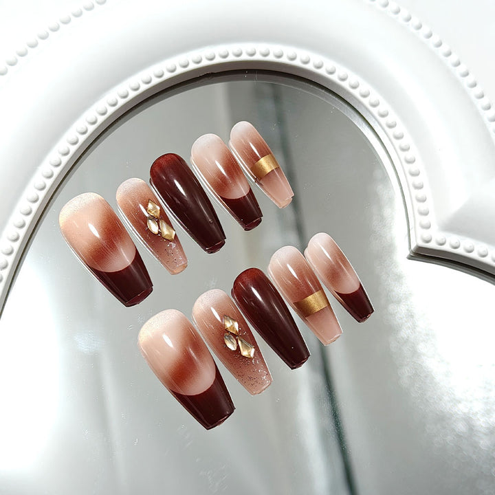 Luxurious artificial nails with glamorous decorations Stornfield