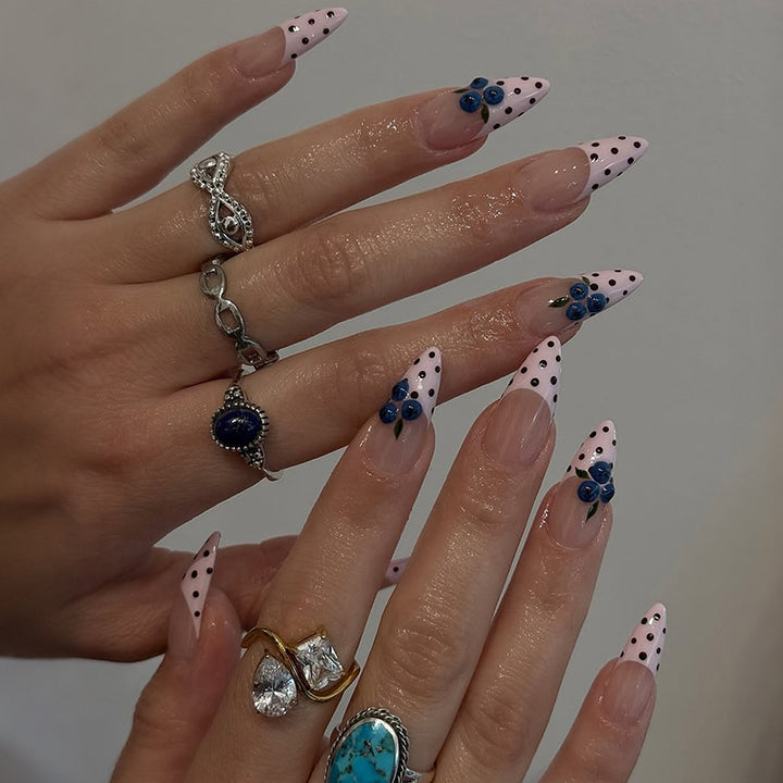 Acrylic nail set with stylish dots and floral embellishments Stornfield