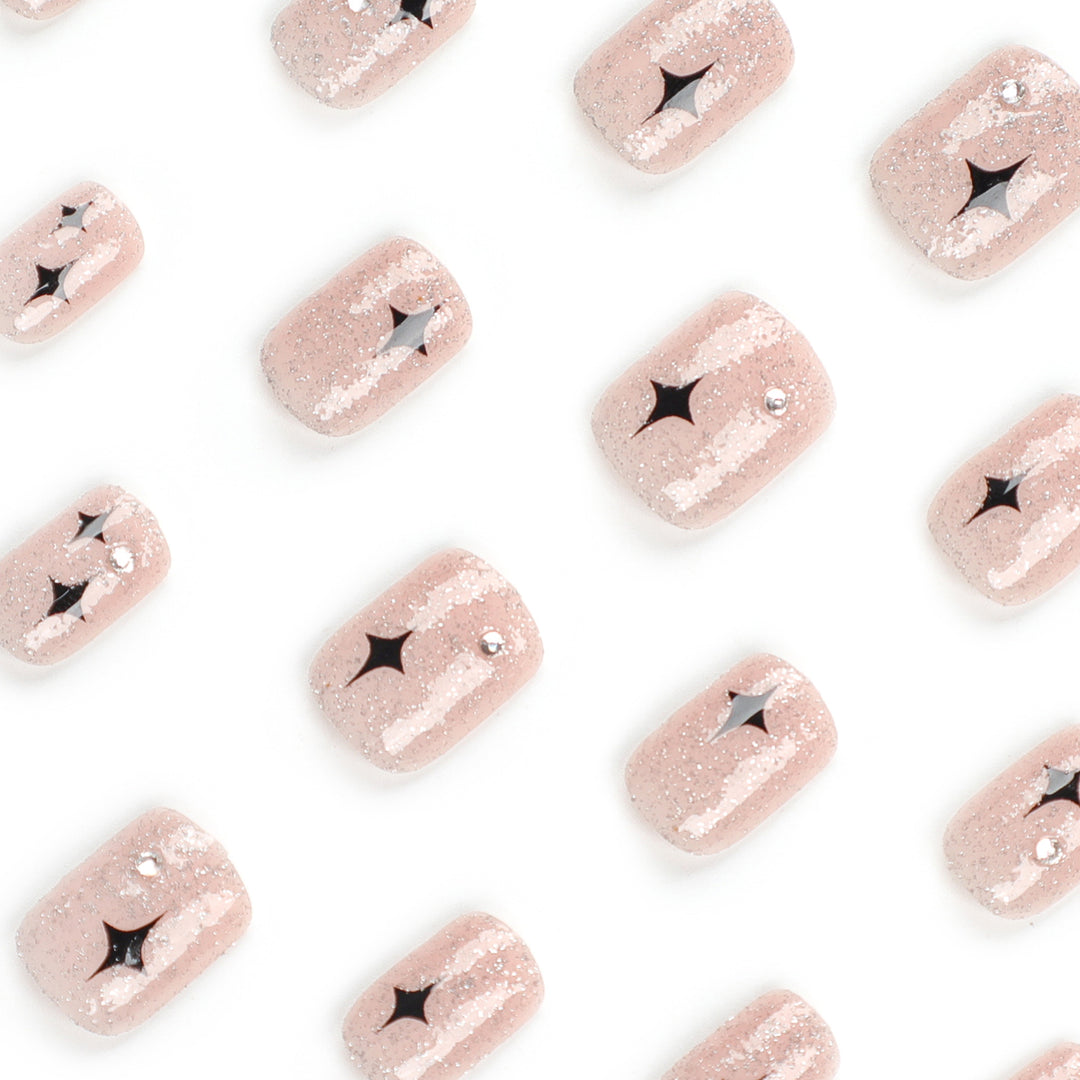 Artful Nail Extensions with Glitter and Star Pattern Stornfield
