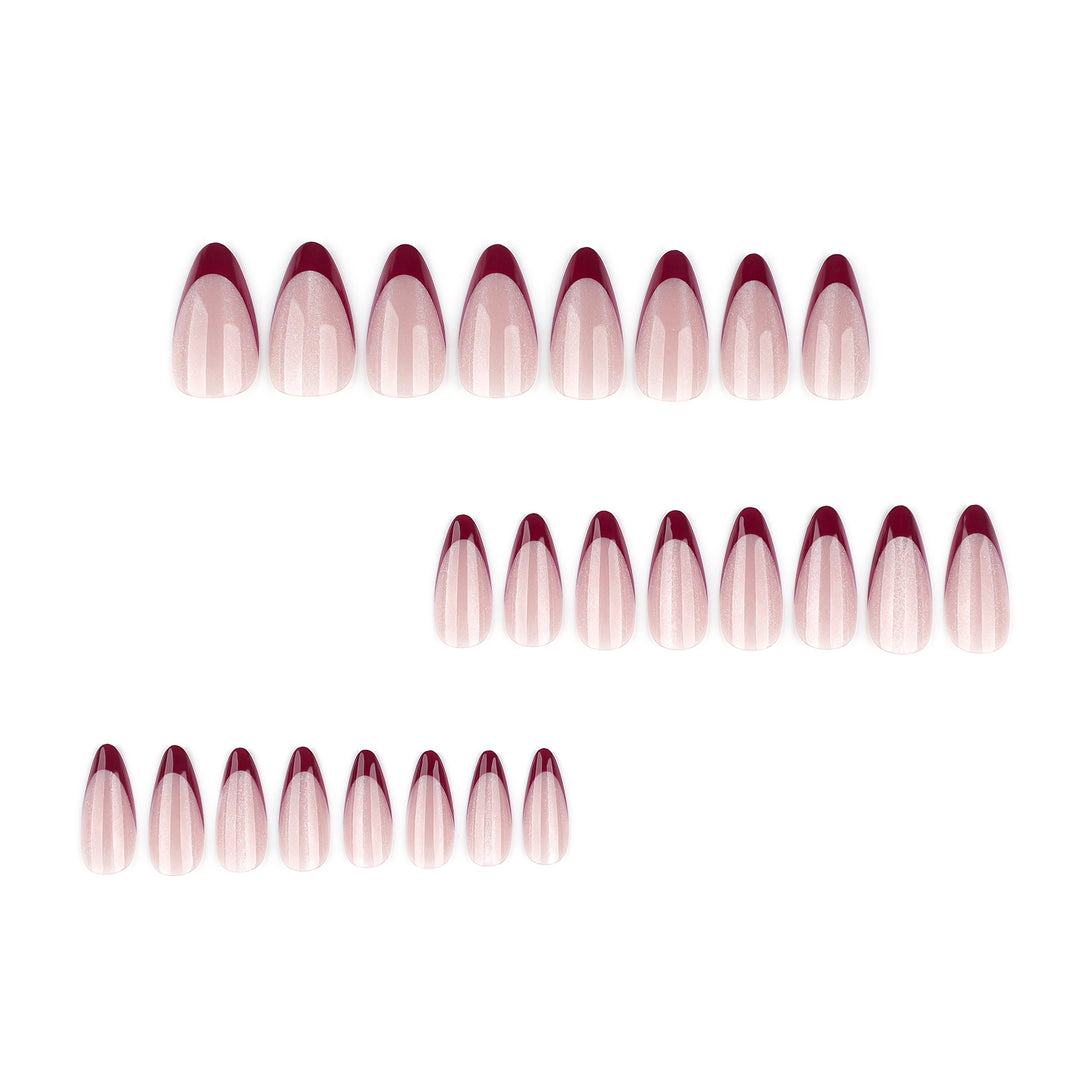 Artificial stiletto nails with sparkling tips Stornfield