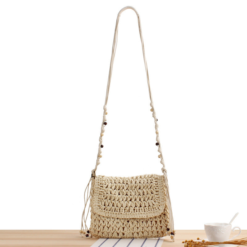 Braided Natural Material Handbag with Playful Fringes Stornfield