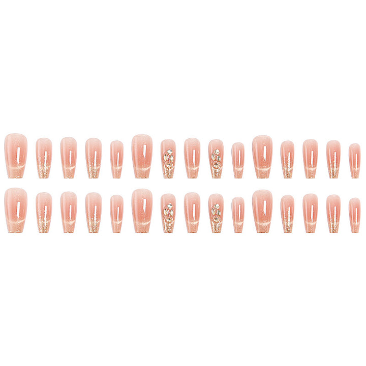 Artificial nail set with sparkling glitter and 3D applications Stornfield