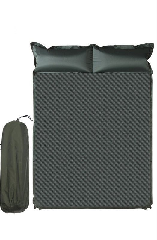 double connectable inflatable camping mattress with integrated dual pillows, egg-crate comfort surface and compact carry sack Stornfield