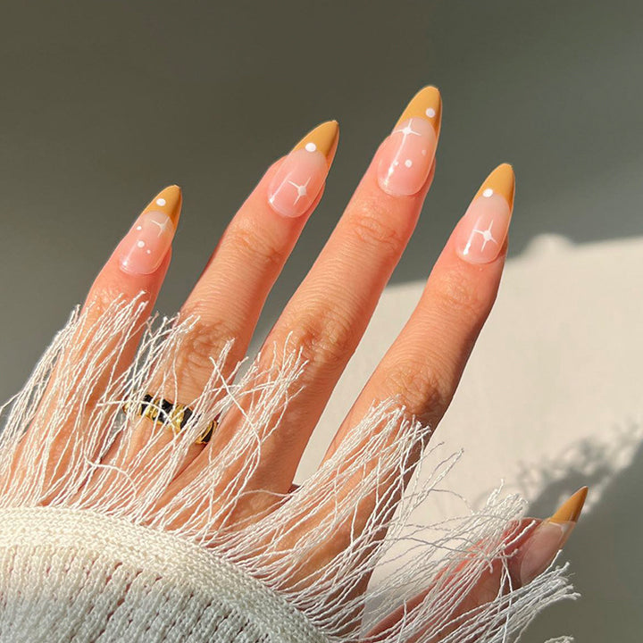 Artful nail extensions with an elegant leaf pattern Stornfield