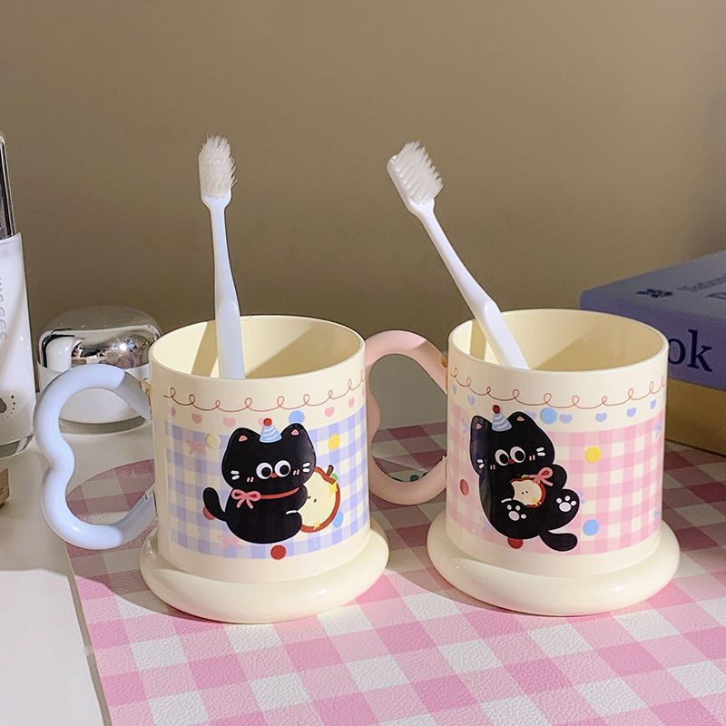 Ceramic mug with playful cat motif Stornfield