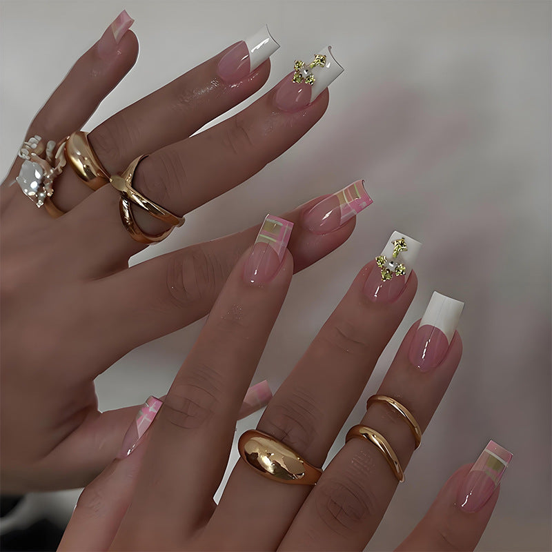 Artificial nail kit with elegant French tips and modern accents Stornfield